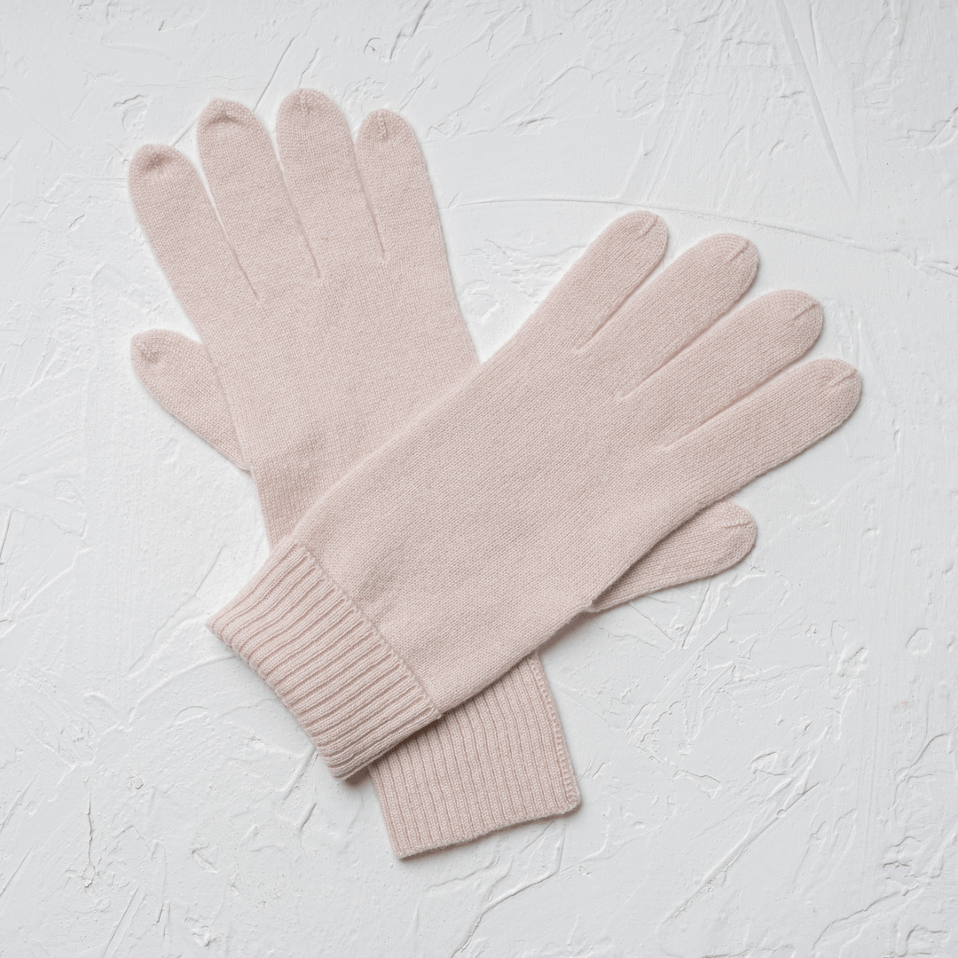 Sea Salt 100% Cashmere Gloves laid flat with left hand on top of right#color_sea-salt